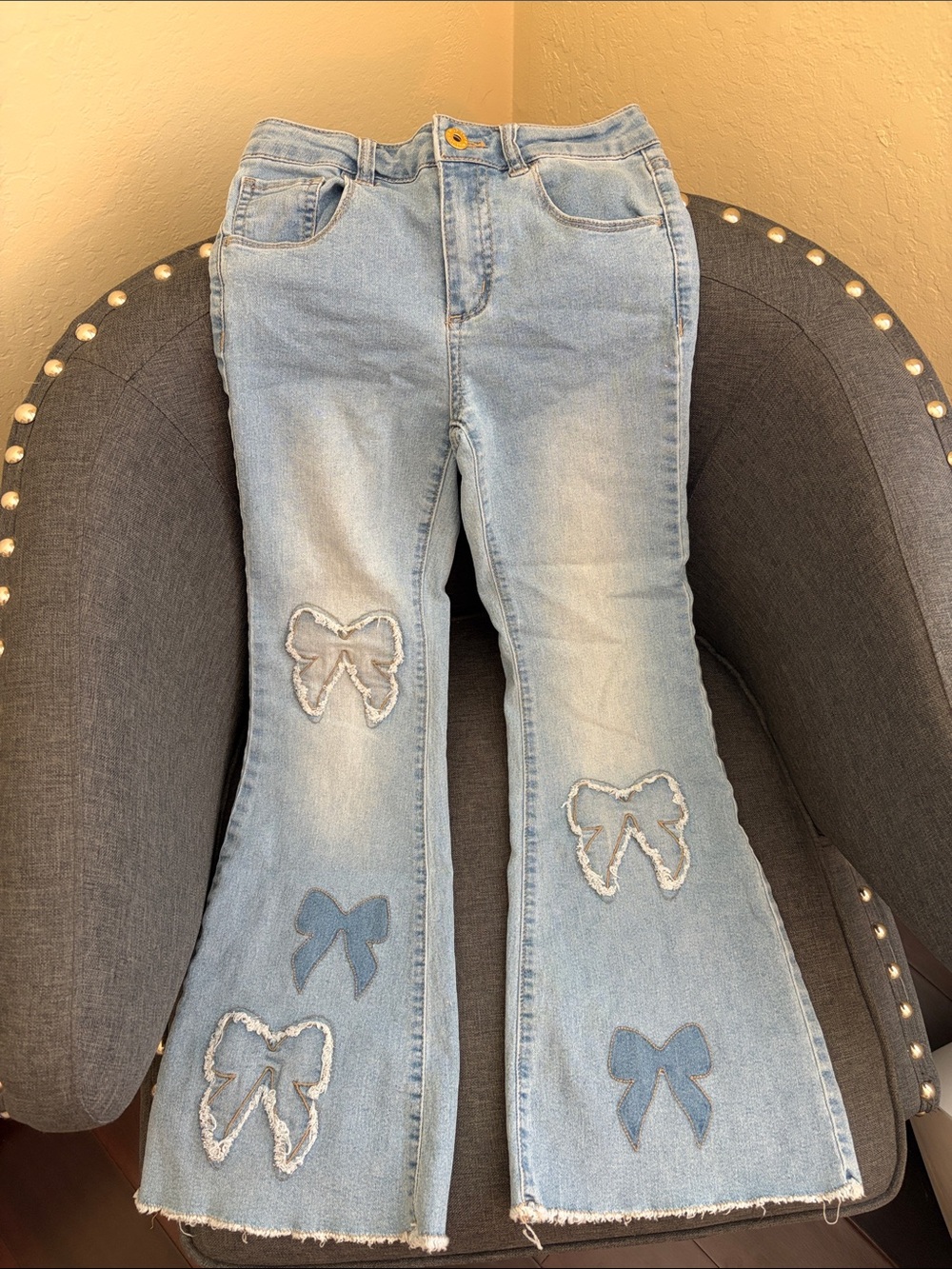 Zunie Light Blue Girls' Flared Jeans with Bow Appliqués. It is very cute.